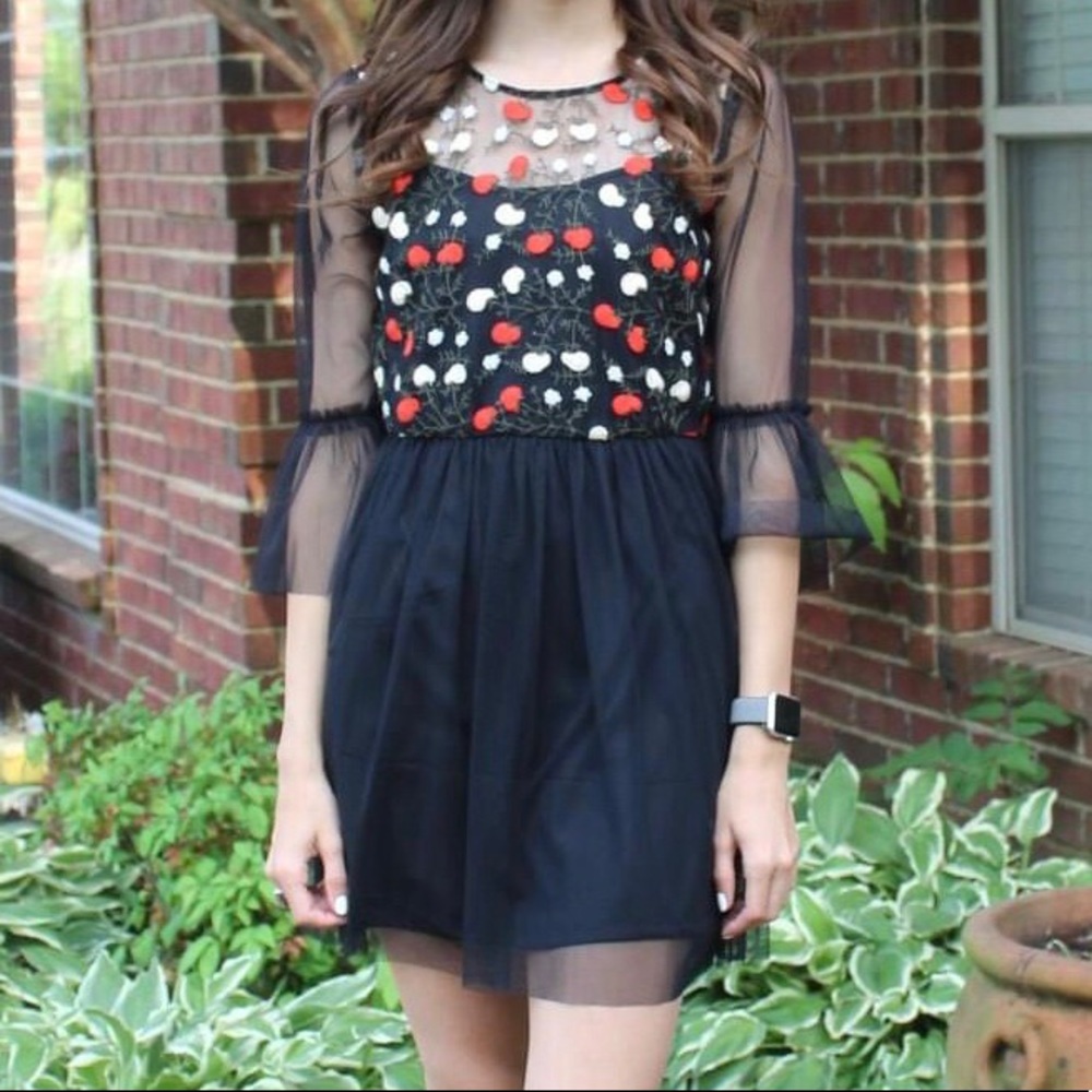 Black Tule Dress With Red and White Flower Detail